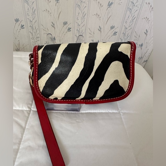 Dooney & Bourke Leather Zebra Wristlet with Red Trim - Picture 2 of 13